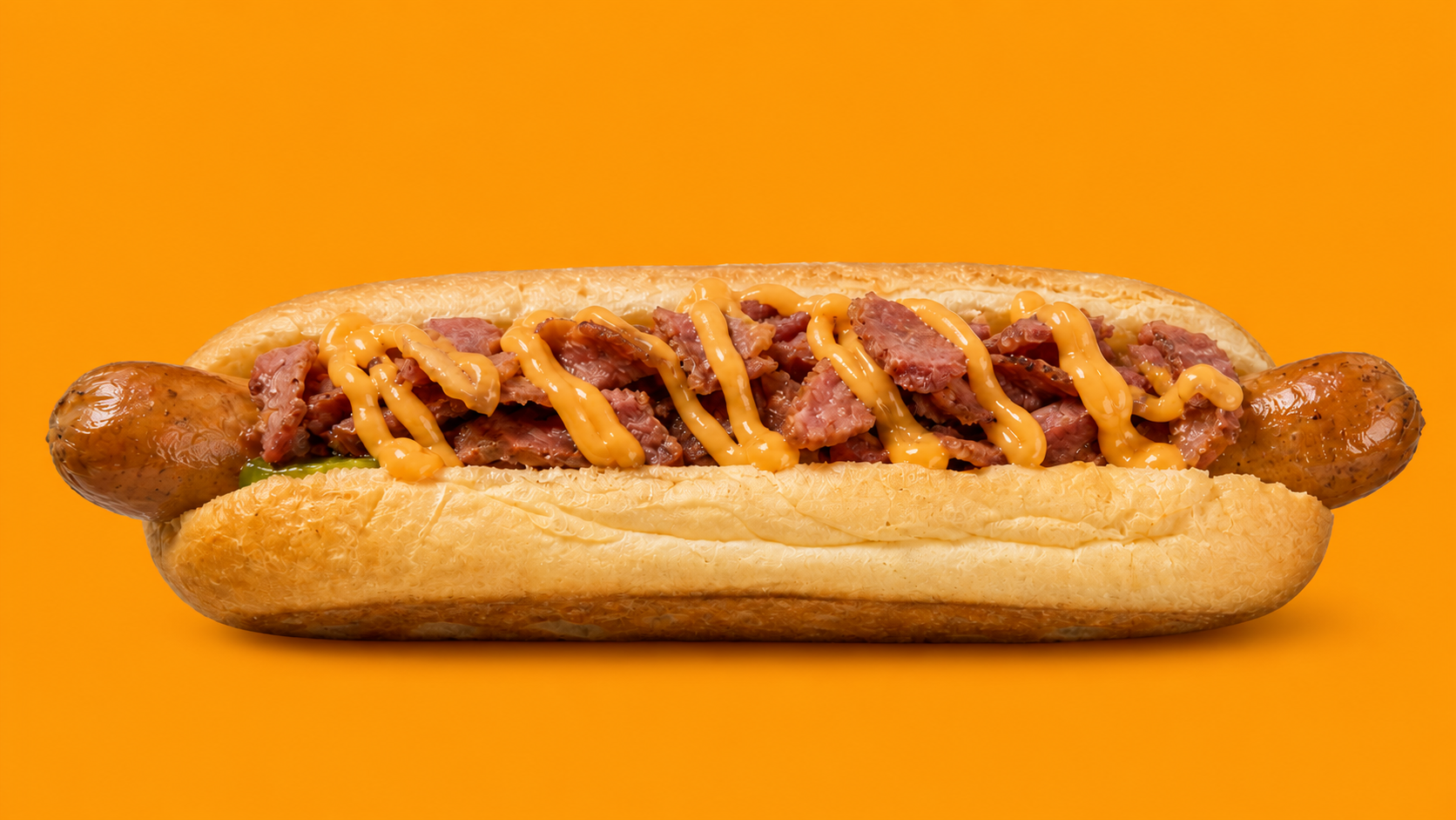 Side profile of a Sober Bites hotdog with sausage, bun and toppings