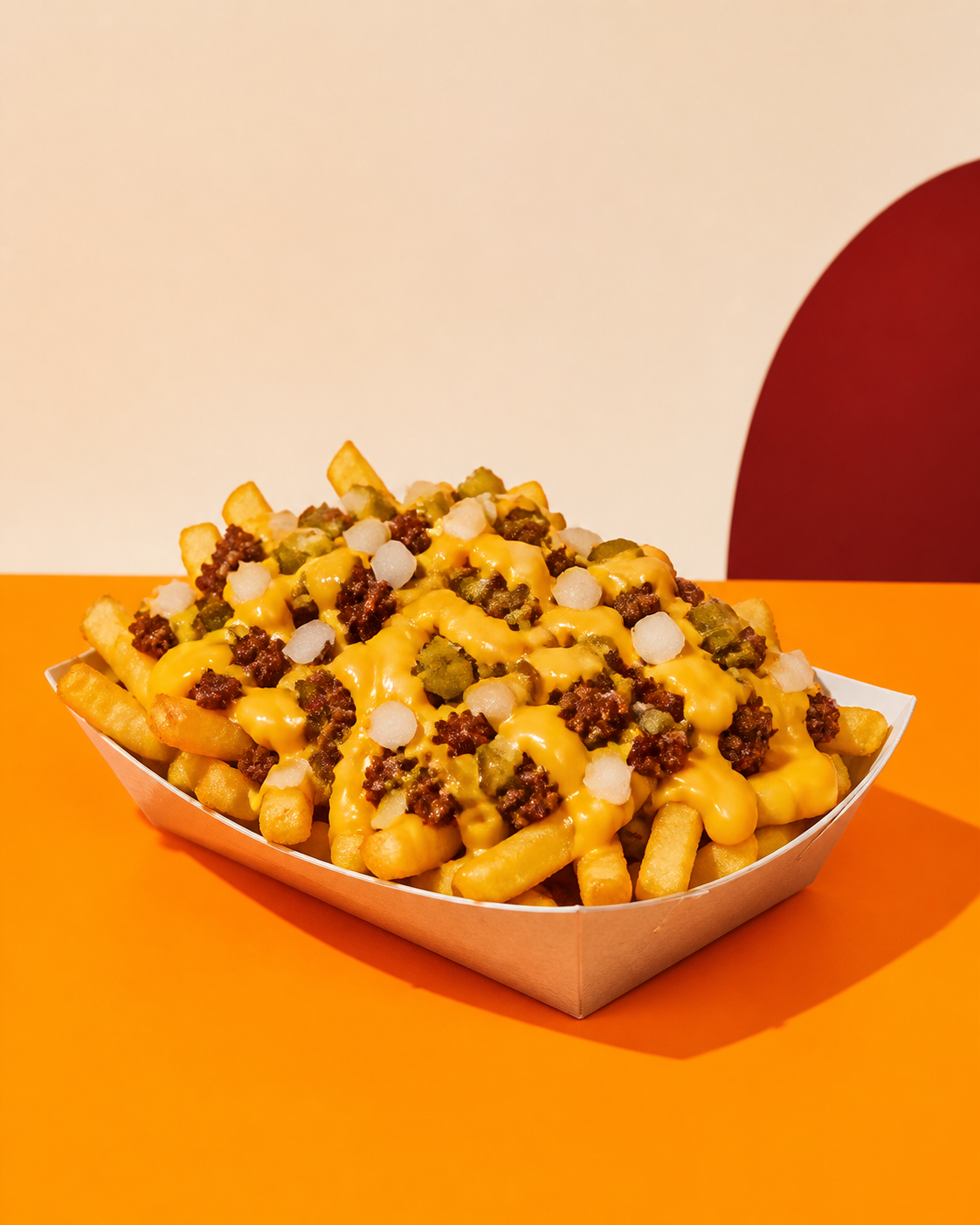 Loaded fries with cheese sauce and savoury toppings